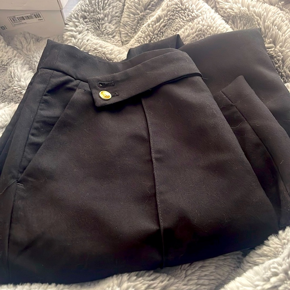 Black straight work pants with cute little belts never worn